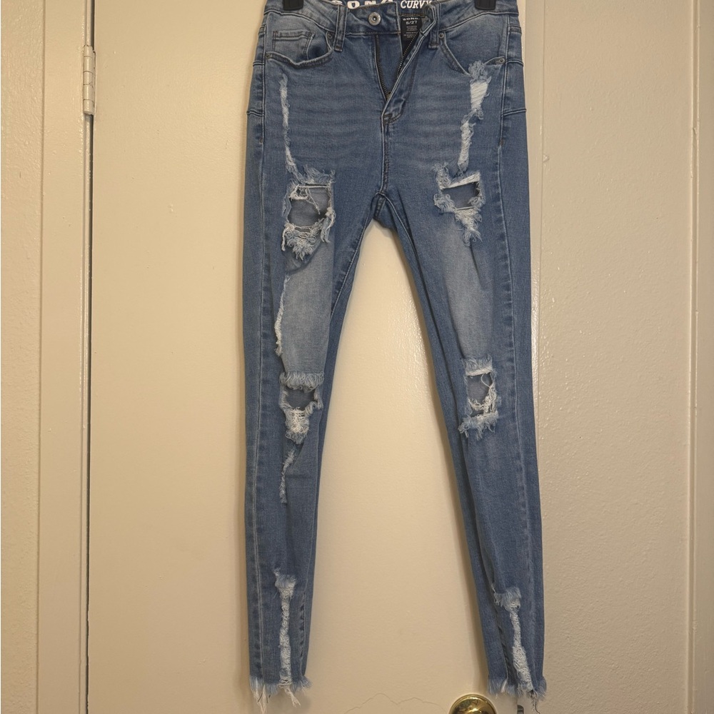 Distressed Blue Jeans